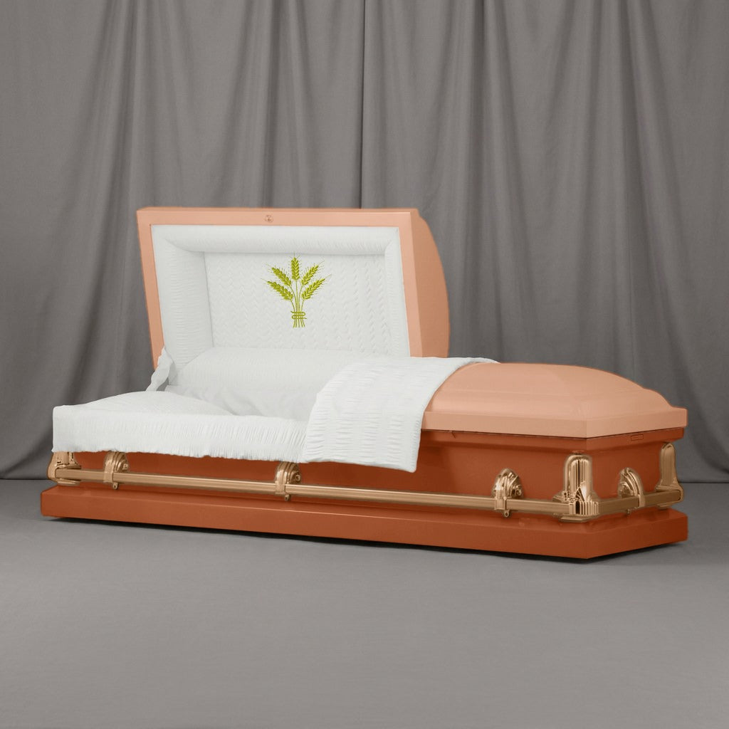 Harvest Casket | Artist Selections — Peach and Copper two-tone steel casket with brass hardware and embroidered Wheat Sheaf head panel