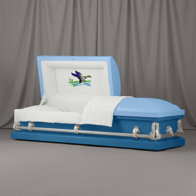 Mallard Casket | Artist Selections — Sky Blue and Ocean Blue two-tone steel casket with silver hardware and embroidered Mallard Duck head panel