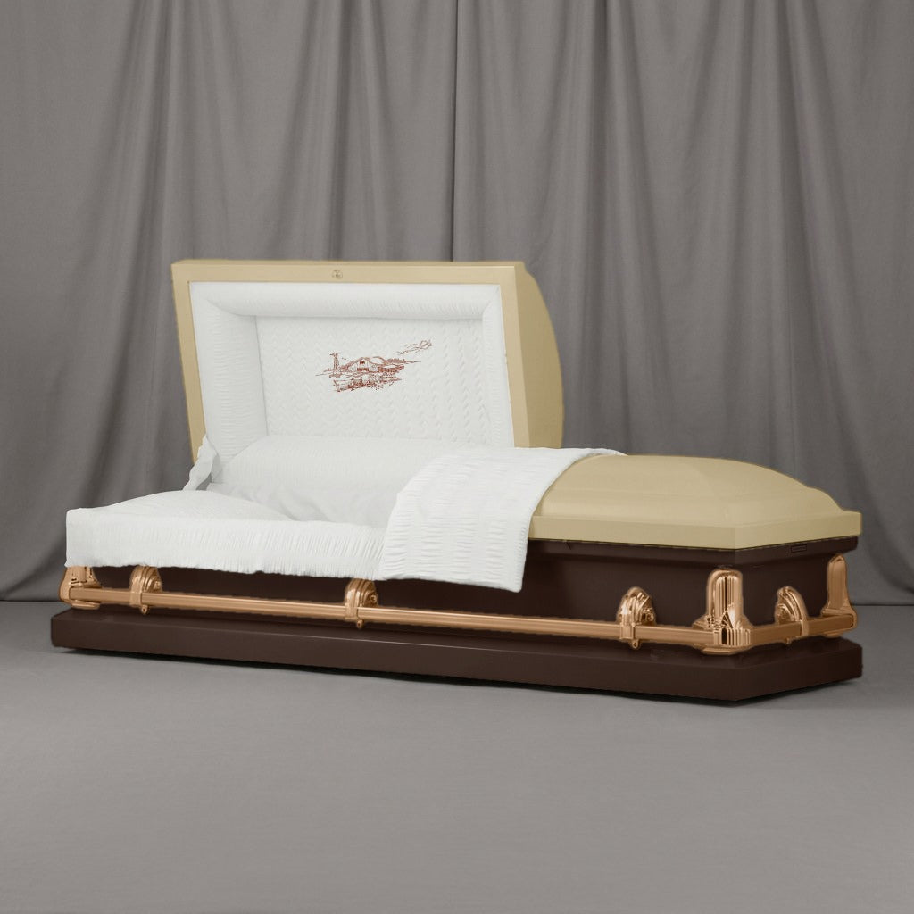 Old Homestead Casket | Artist Selections — Sand and Espresso two-tone steel casket with brass hardware and embroidered Old Homestead head panel