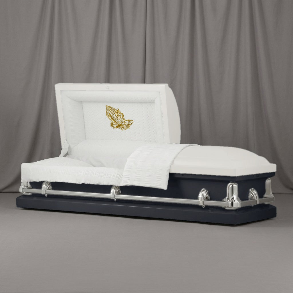 Praying Hands Casket | Artist Selections — White and Charcoal two-tone steel casket with silver hardware and embroidered Praying Hands head panel