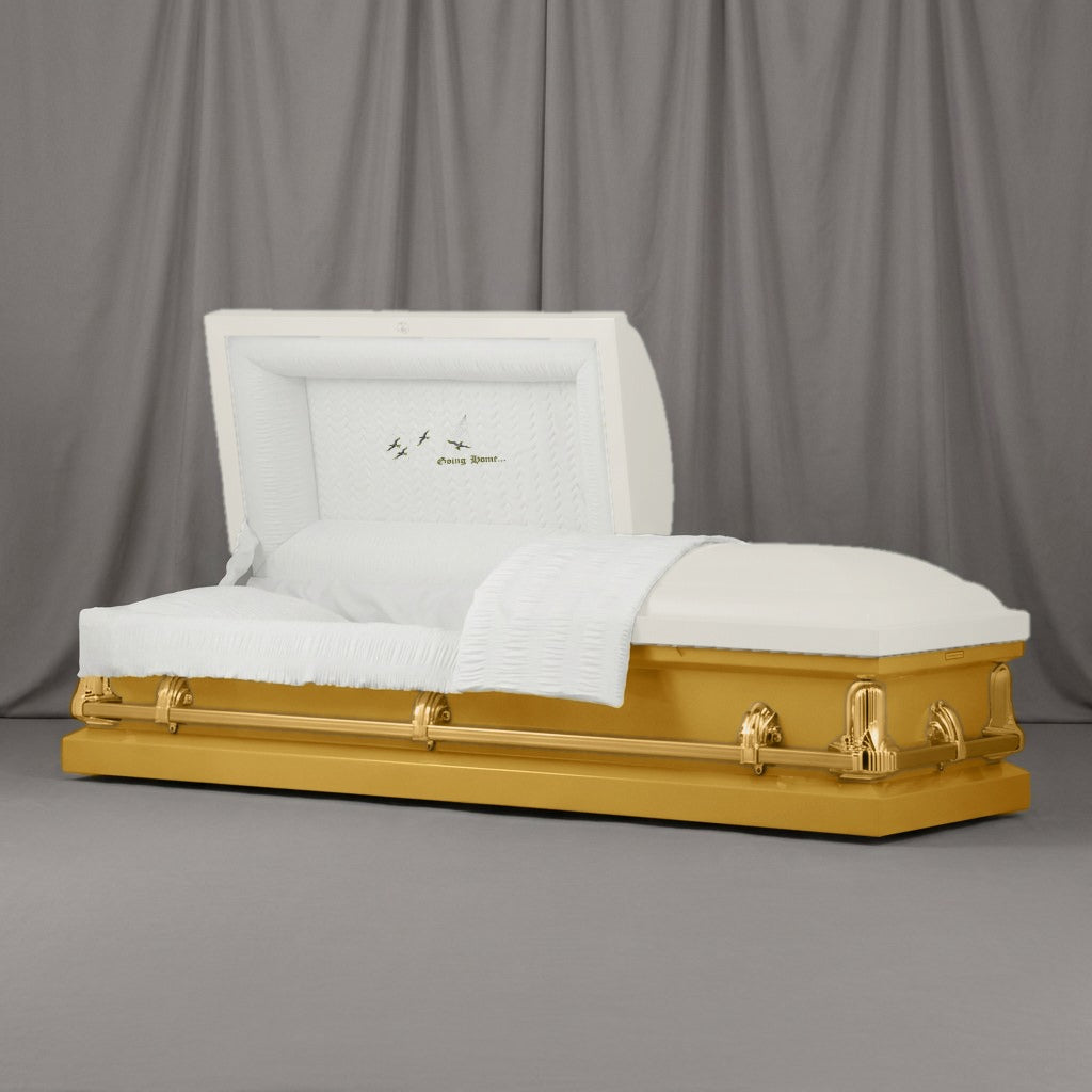 Going Home Casket | Artist Selections — Ivory and Gold two-tone steel casket with gold hardware and embroidered Going Home Rays head panel
