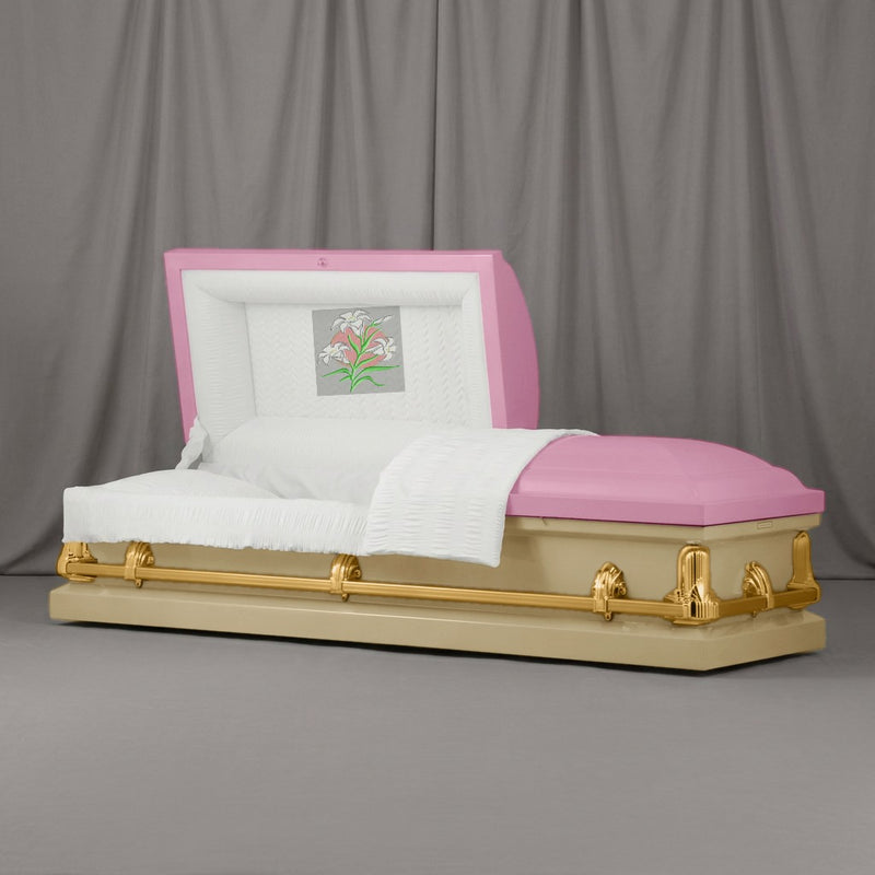 Lilies Casket | Artist Selections — Rose Pink and Sand two-tone steel casket with gold hardware and embroidered Lilies head panel