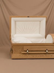 The Oval-Top Oak Casket