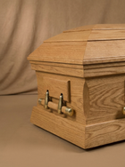 The Oval-Top Oak Casket