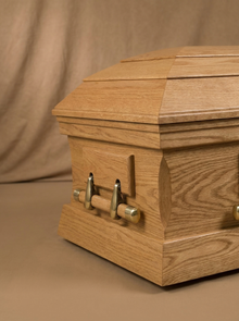 The Oval-Top Oak Casket