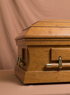 The Oval-Top Poplar Casket (RECHECK DESC)